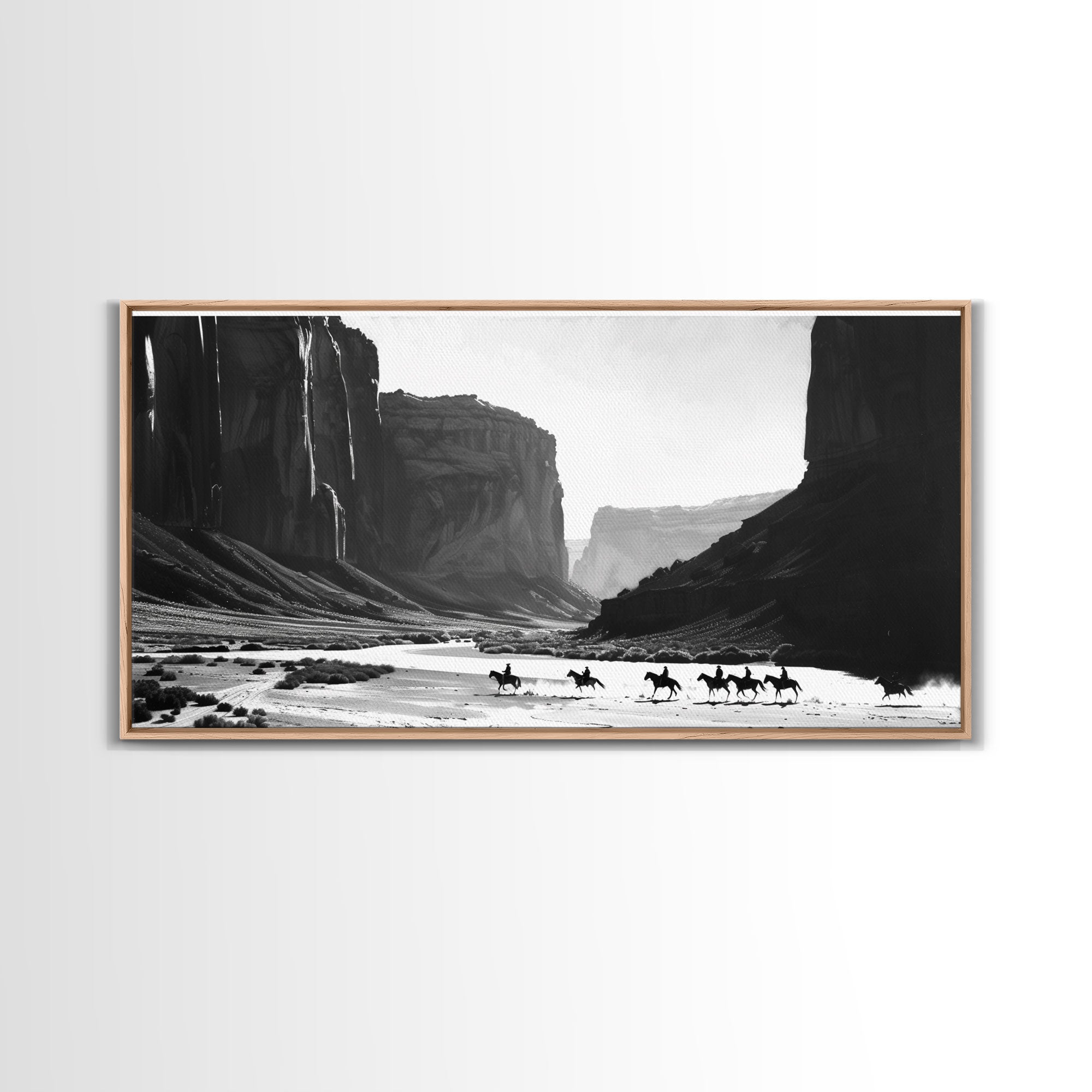 Cowboys Riding Through Canyon – Framed Western Canvas Print