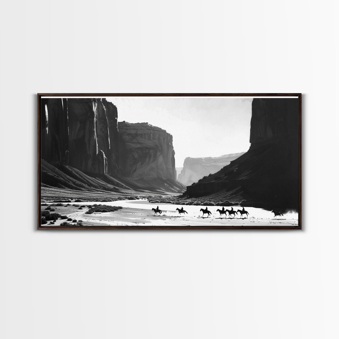 Cowboys Riding Through Canyon – Framed Western Canvas Print